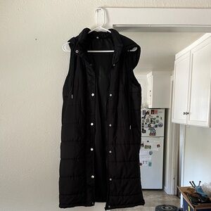 Long pocketed hooded puffer vest. Size small